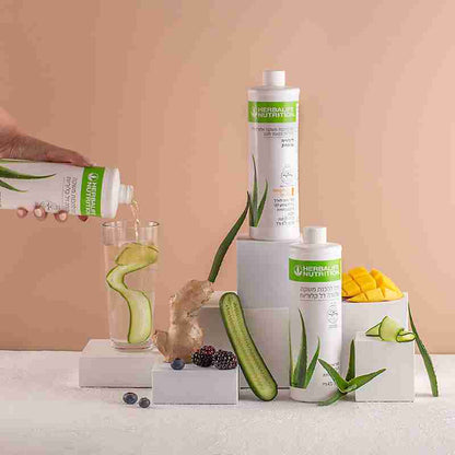 Cosmetic products with aloe vera leaves and fruits on a neutral background